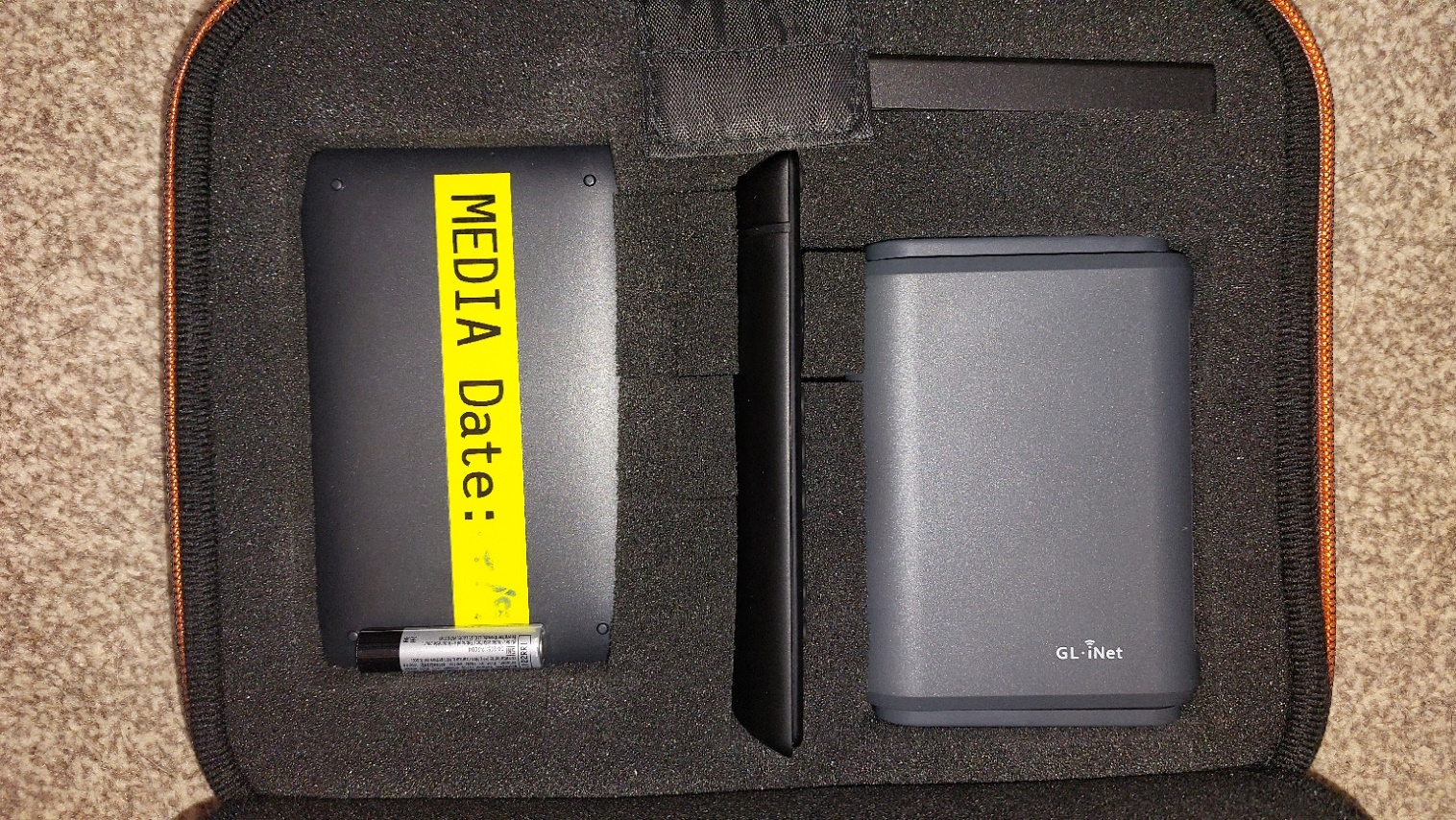 GL.inet Slate Plus, USB hard drive and firestick in case